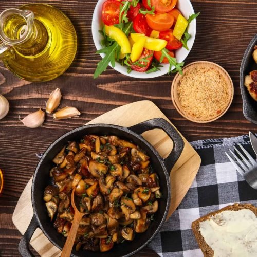 fried-mushrooms-and-sausage-in-cas-iron-skillet-VB8L5VD.jpg